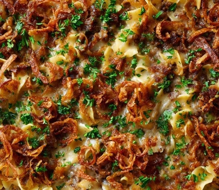 Delicious creamy French onion beef casserole topped with melted cheese