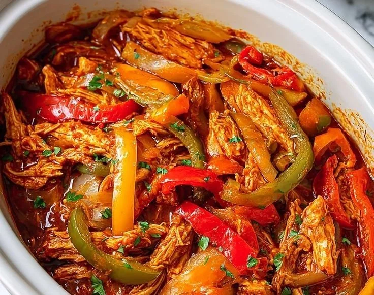 Delicious crockpot chicken fajitas served with fresh vegetables