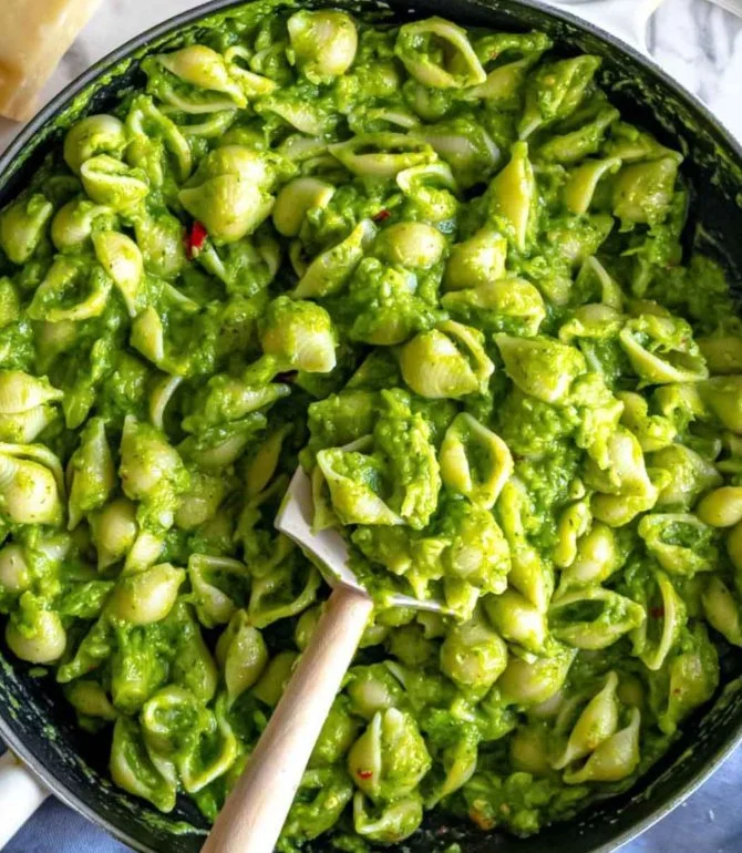 Plate of easy healthy broccoli pasta with garlic sauce and parmesan cheese