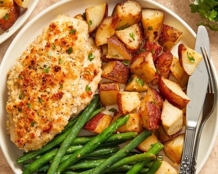 Parmesan Crusted Chicken cooked on a sheet pan with vegetables