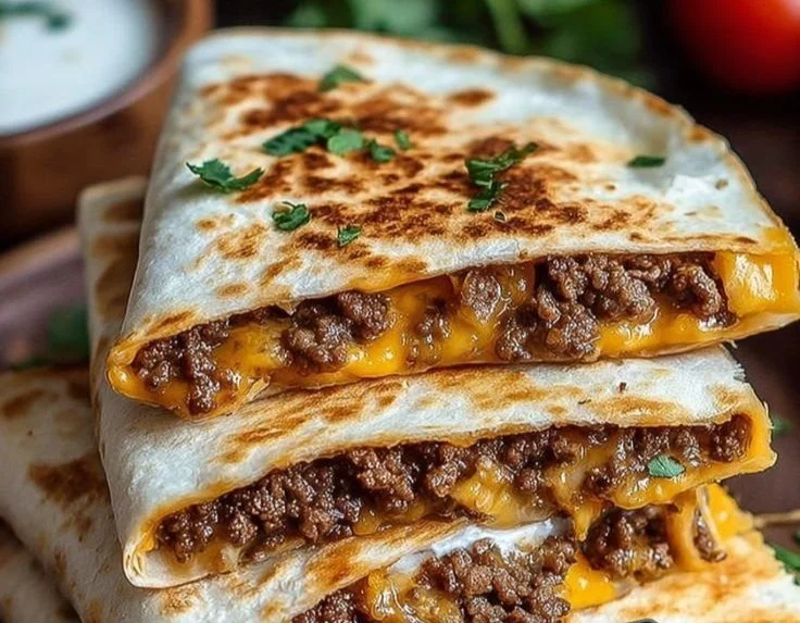Delicious Smashburger Quesadillas served with fresh ingredients and melted cheese.