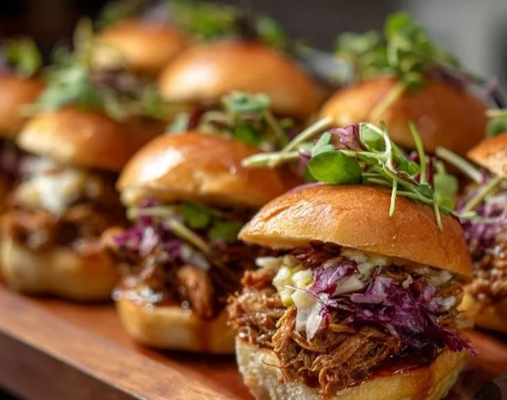 Apple Cider Pulled Pork Sliders with Pomegranate Bourbon BBQ Sauce