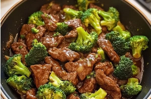 Delicious Beef and Broccoli Stir-Fry served in a bowl with colorful vegetables