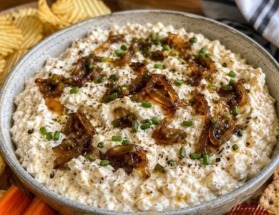 Delicious French Onion Cottage Cheese Dip served with snacks