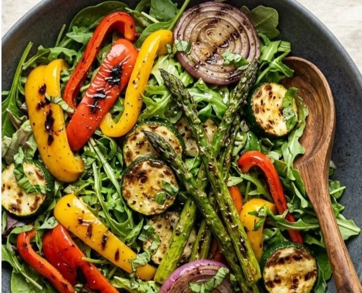 Colorful grilled vegetable salad with lemon basil vinaigrette dressing