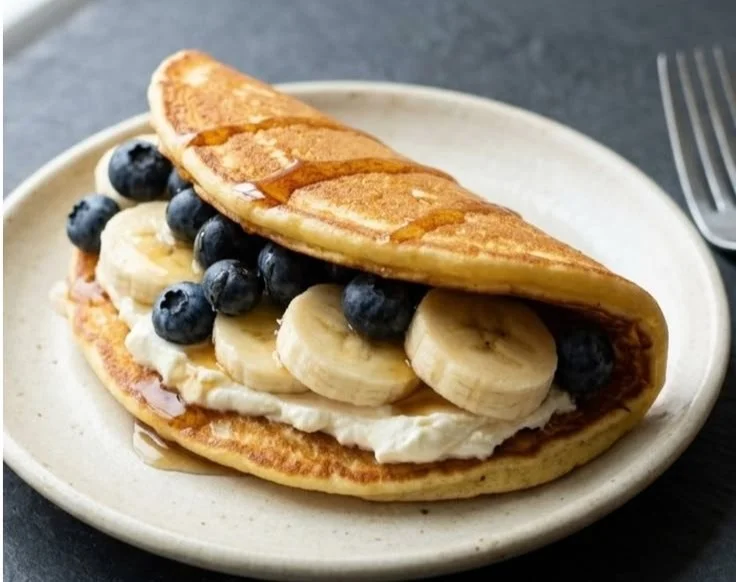Delicious pancake tacos filled with fresh fruits and toppings